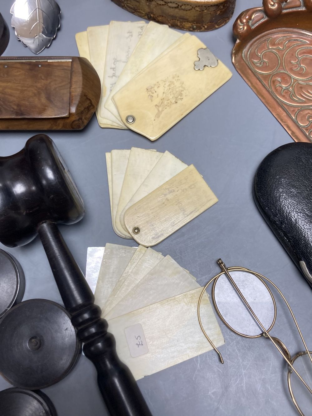 A quantity of collectables including ivory aide memoires, a circular quill box, etc.